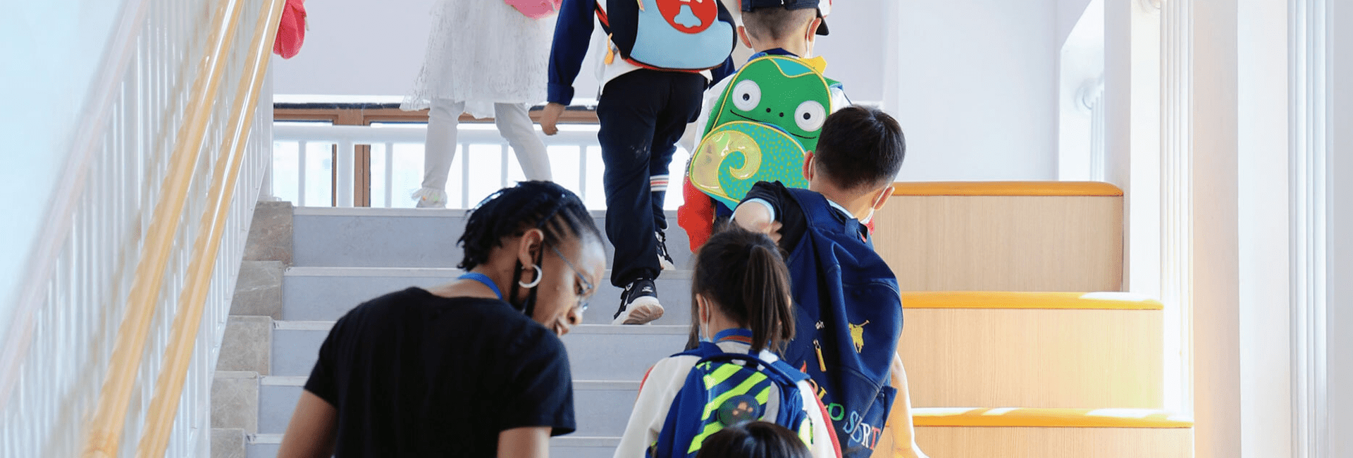 new-hero-2022-mobile teacher and students
